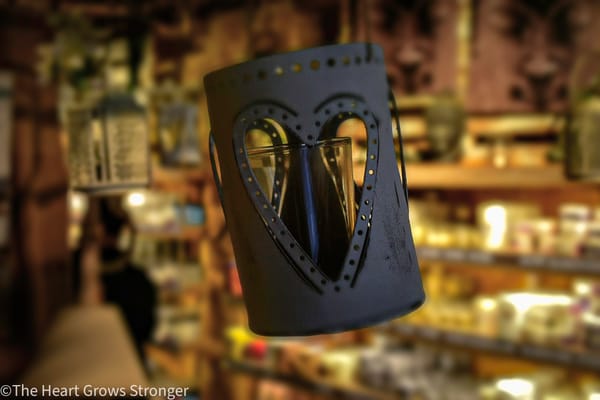 A small lantern with a heart-shaped opening.